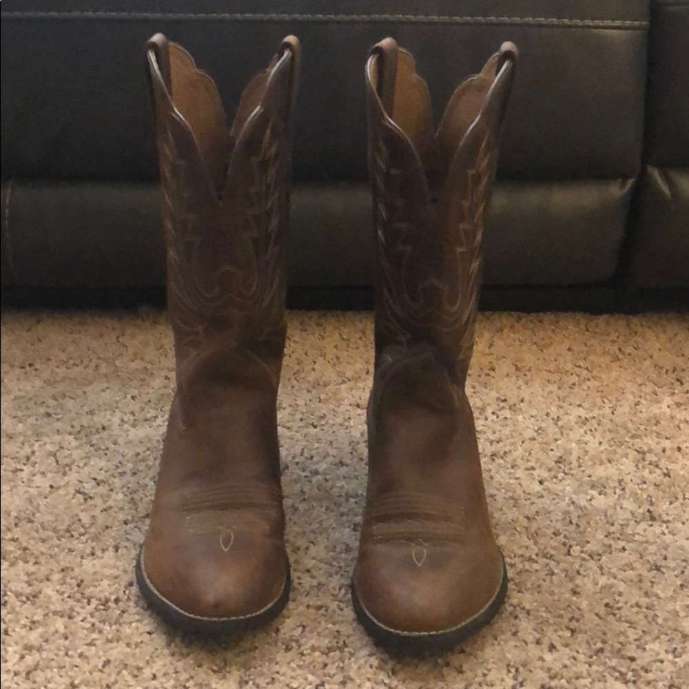 Cowgirl boots light wear and tear.
